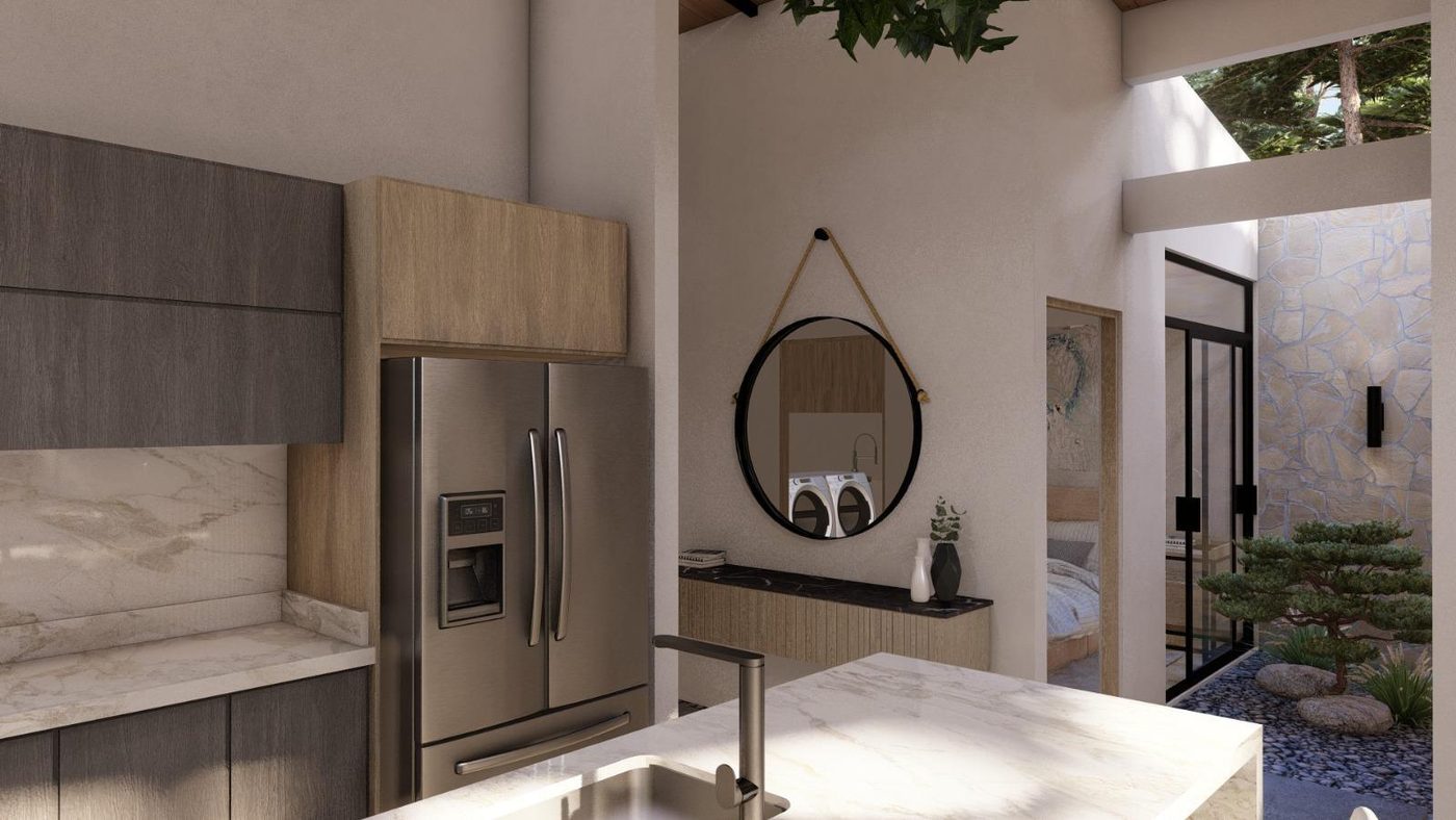Zona de cocina con acceso al patio de pilas y al jardín interno