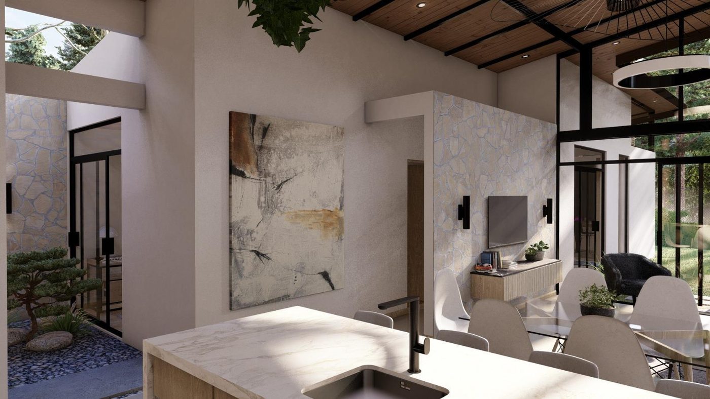 Comedor con vista al jardín interno de piedra